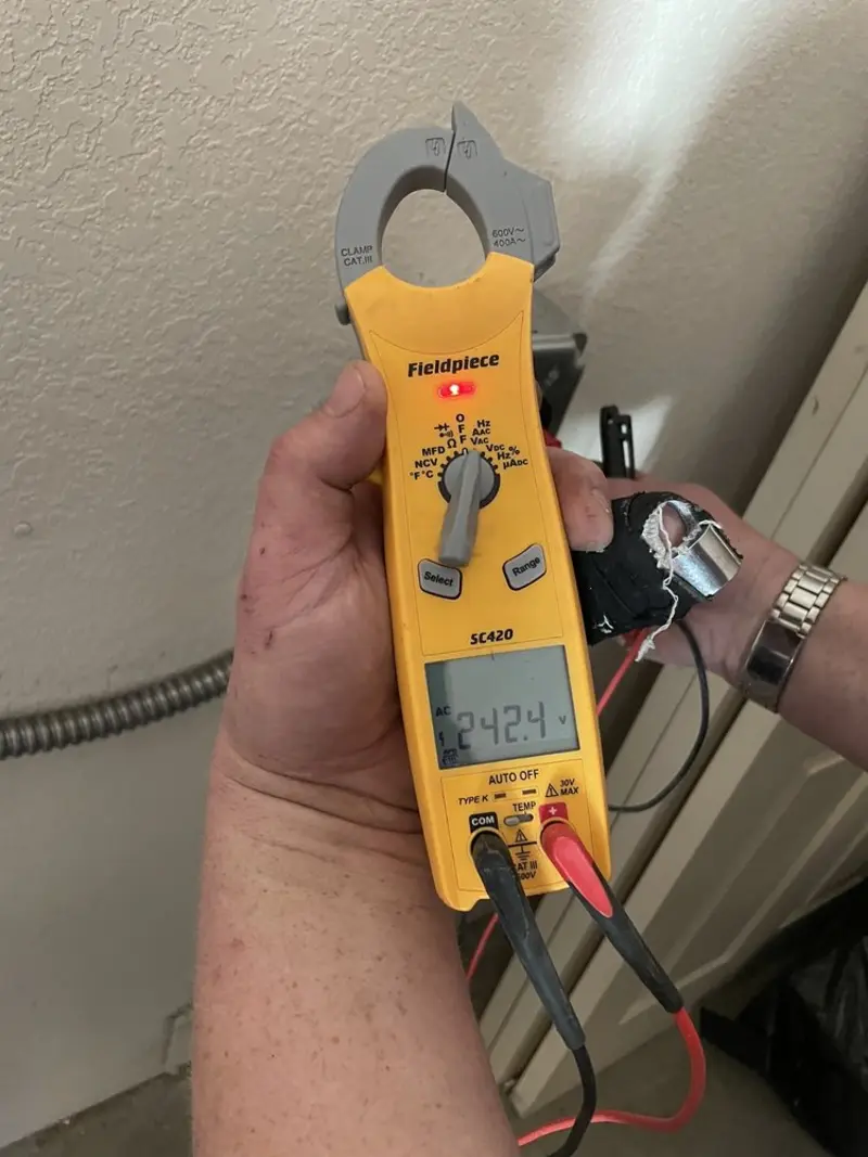 Voltage testing with clamp meter during Whole House Surge Protector in Saddle River